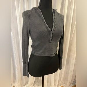 Waffle knit out from under long sleeve